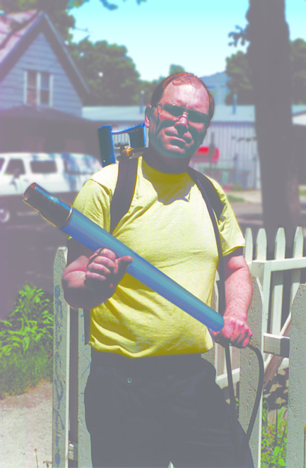 Man with Flamethrower Waiting for Appropriate Time to Use It