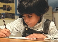 Third-Grader Awaits Lesson For Cursive G