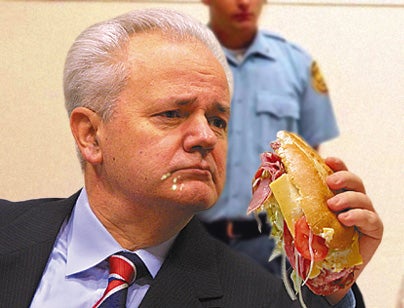 Defiant Milosevic Eats Big, Sloppy Sandwich During Trial