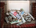 Newspapers Piling Up On Dead Homeowner's Doorstep