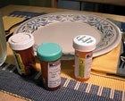 Grandfather's Place At Dinner Table Marked By Pills