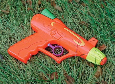 Water Pistol Fired Using Sideways Gangsta Grip