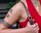 Woman's Body Confusing Jumble Of Celtic, Egyptian, Japanese Symbols