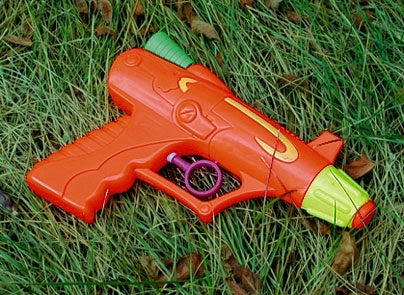 Water Pistol Fired Using Sideways Gangsta Grip