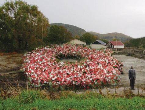 Kofi Annan Places 4,000-Pound Wreath On Mass Grave