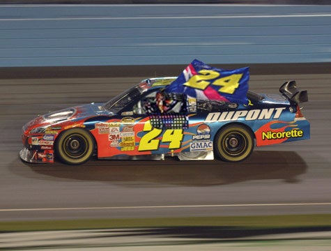 Jeff Gordon Celebrates Equaling Earnhardt's Win Record With Giant Flag Honoring Jeff Gordon