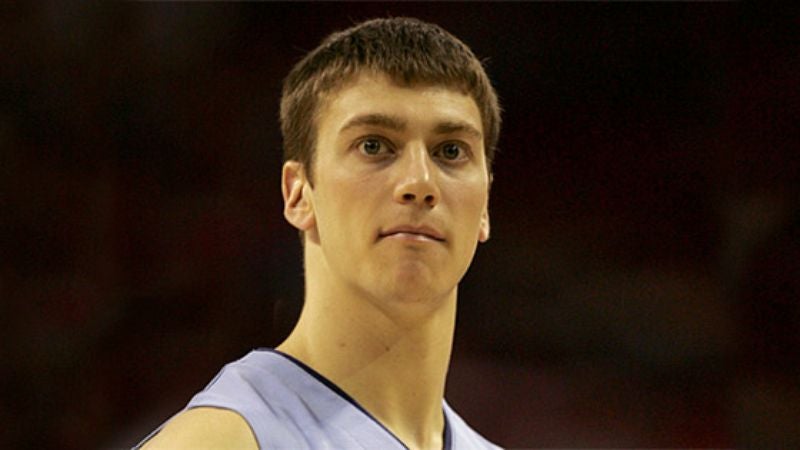 White College Player Does Hair Before Game