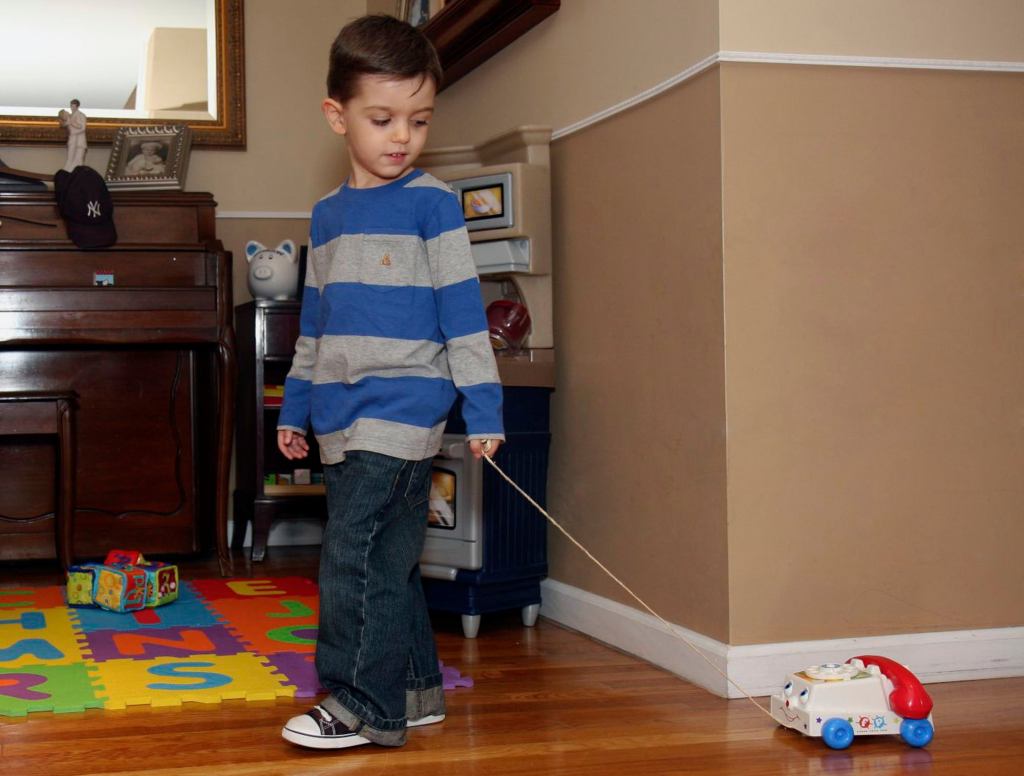 Toy Prepares Child To One Day Pull Around Real Telephone On Wheels