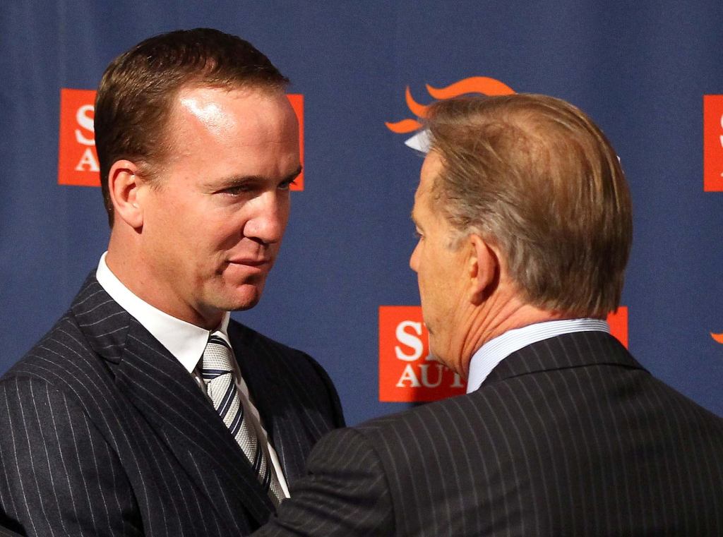 Knowing Glance Between Peyton Manning And John Elway Entering Third Hour