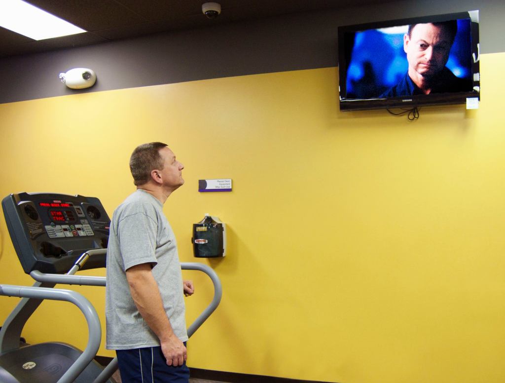 Man At Gym Just Watching TV