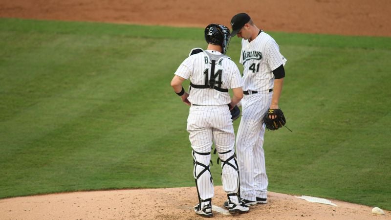 Embarrassed Catcher Not Sure What He Came To Mound For