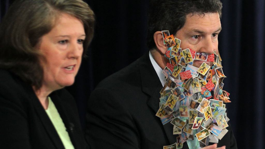 Bored U.S. Postmaster General Creates Beard From Stamps During Meeting