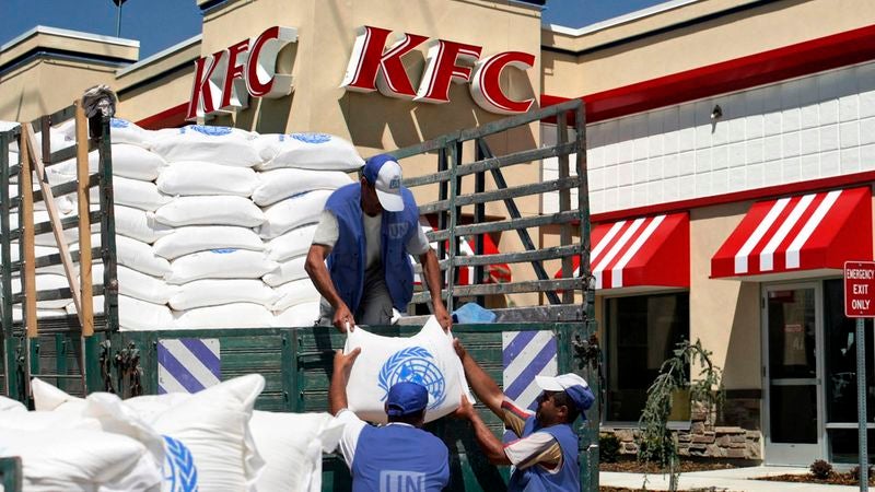 U.N. Aid Workers Distributing Food To Malnourished KFC Customers