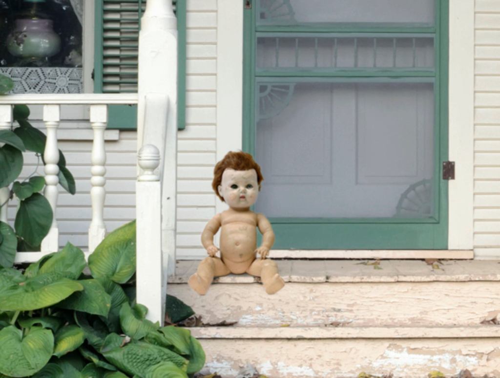 Horrifying Doll Sitting On Neighbor's Porch Whether It's Halloween Or Not