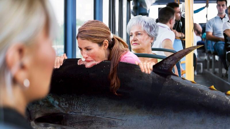 Inconsiderate Woman On Bus Eating Live Tuna