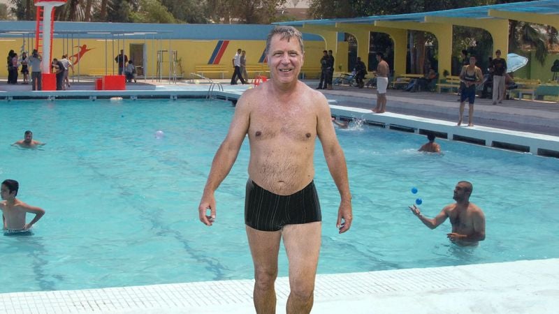 Man Wearing Low-Cut Swimsuit As Though Public Pool A Sun-Kissed Sardinian Cove