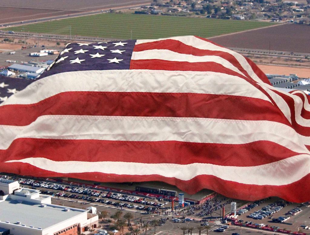 Giant American Flag Draped Over Entire Stadium During National Anthem