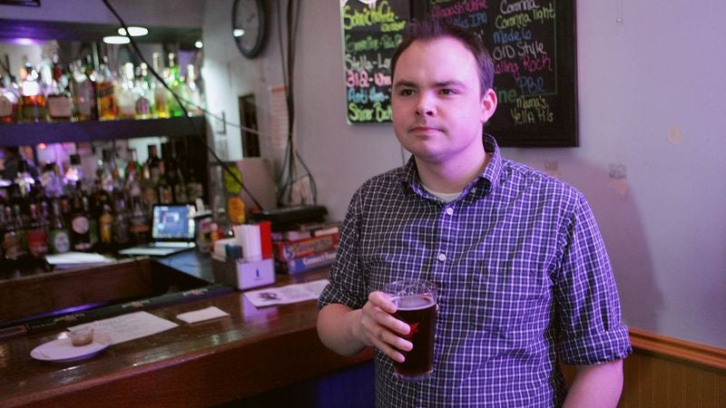 Man Anxiously Scanning Bar’s Reaction To Jukebox Selection