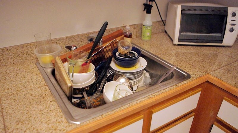 Master Architect Constructs Most Structurally Innovative Pile Of Dirty Dishes To Date