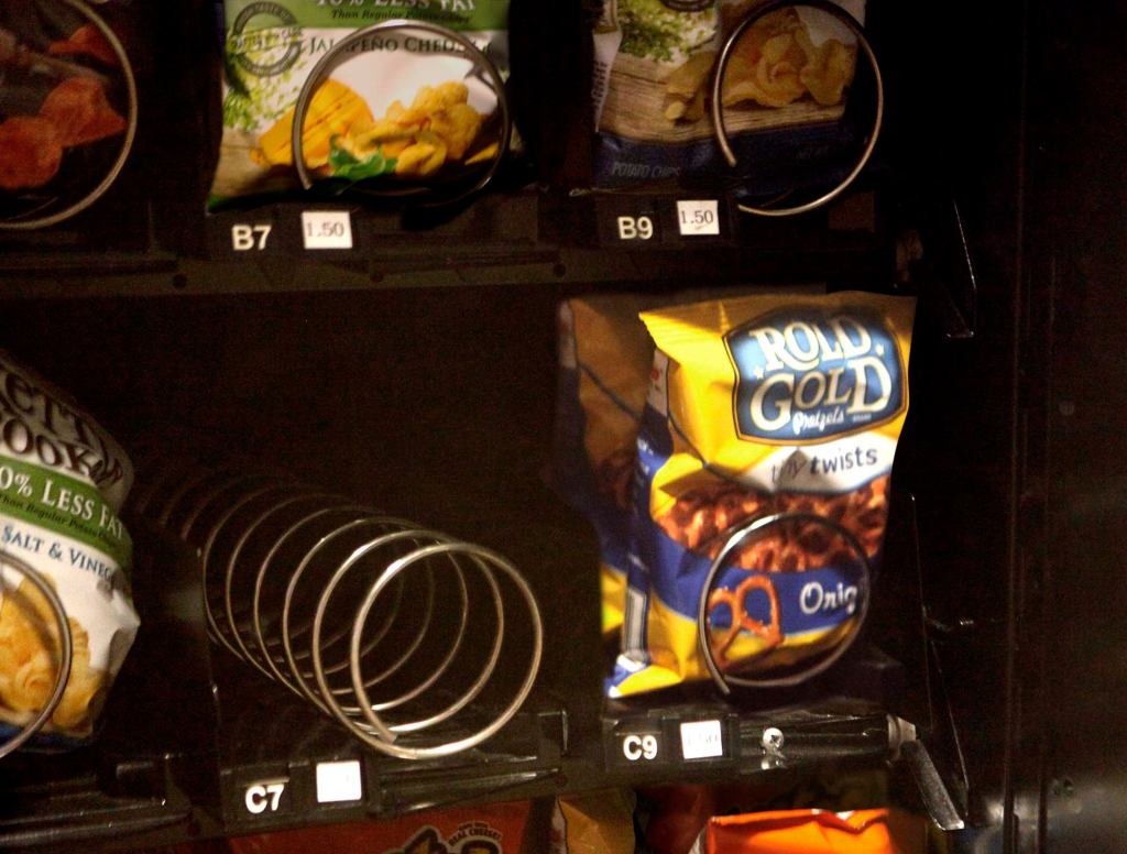 Snack That Resided In Empty Vending Machine Slot Must Have Been Delicious