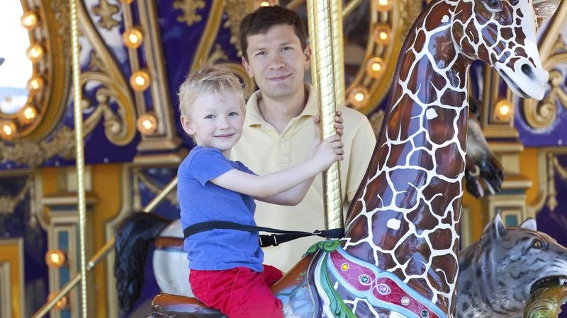 Pathetic 4-Year-Old Needs Father To Stand On Merry-Go-Round Platform For Entire Ride