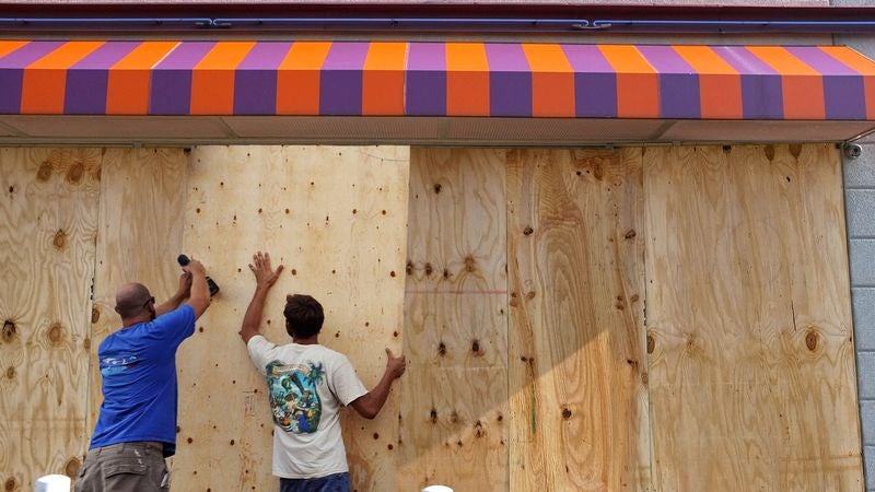 Baltimore Preparing For Hurricane Joaquin By Adding Second Layer Of Plywood To Shuttered Small Businesses