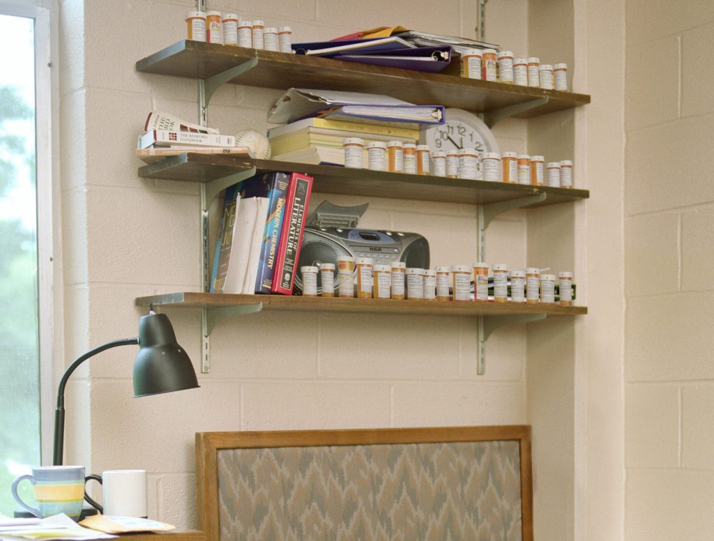 Dorm Room Decorated With Empty Bottles Of Adderall