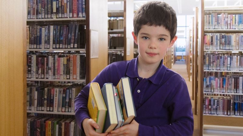 Third-Grader Clearly Biting Off More Than He Can Chew At Elementary School Book Fair