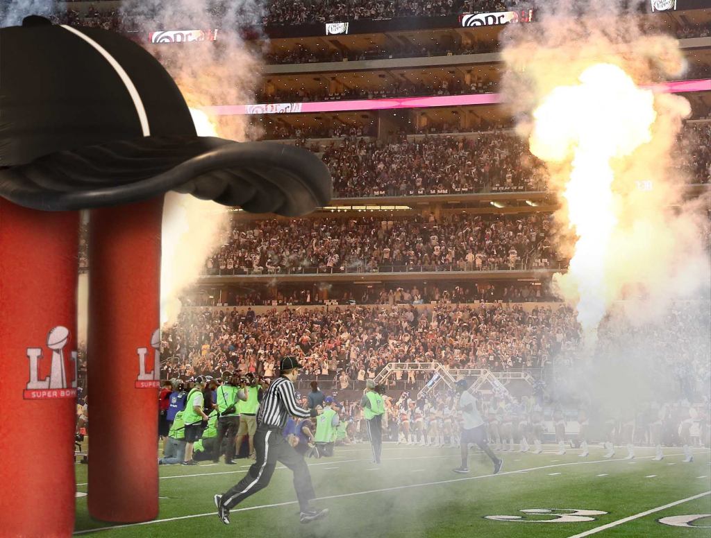 Official Sprints Through Giant Inflatable Referee Hat To Take Field For Super Bowl