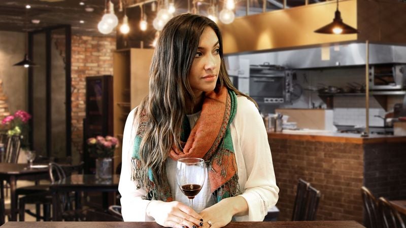 Woman’s Primal Instincts Activate To Protect Nearly Finished Glass Of Wine From Approaching Server