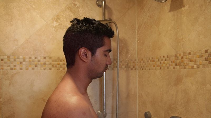 Man Coming To Terms With Fact That Shower Not Getting Any Hotter