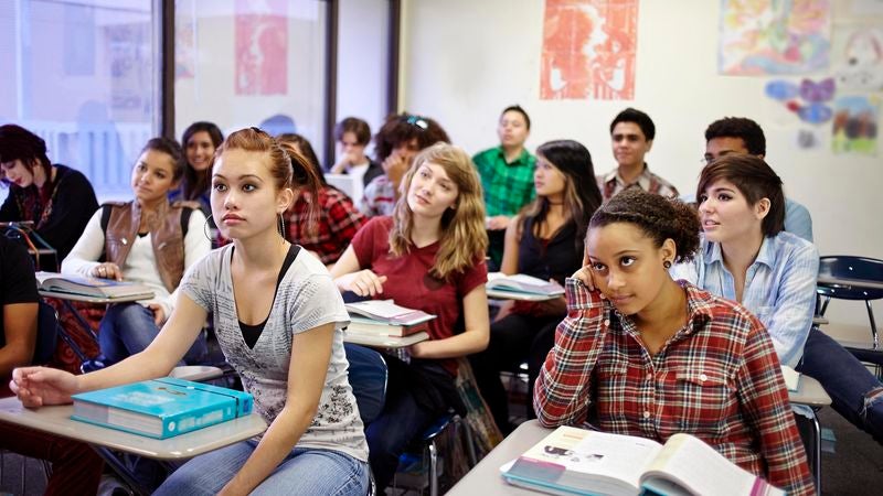 Seventh-Grade Class Scrambling To Piece Together Teacher’s Home Life From Desktop Background Before PowerPoint Opened