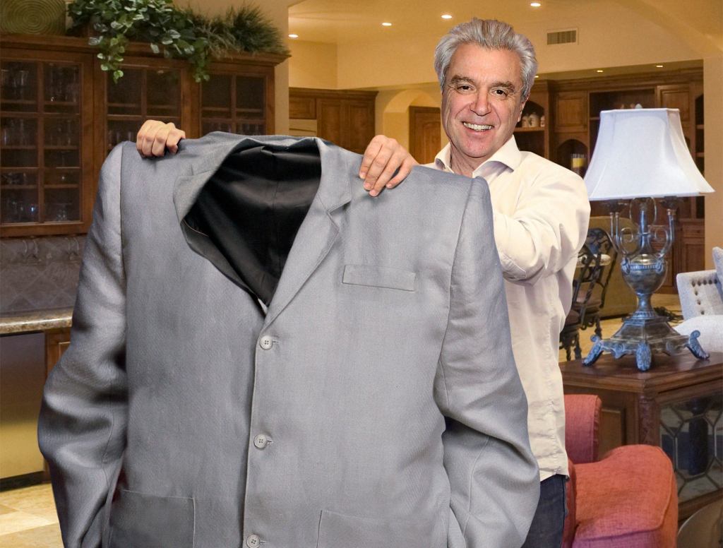 David Byrne Holds Up Old Suit To Show How Far He’s Come In Weight Loss Journey