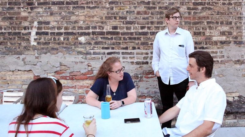 Man Surveys Party For Next Group To Silently Stand In