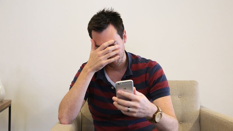 Report: Most Americans Now Getting Their News While Peeking Out Between Fingers