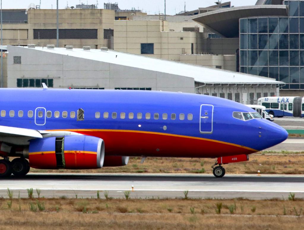 Trash Bag Taped Over Broken Southwest Plane Window