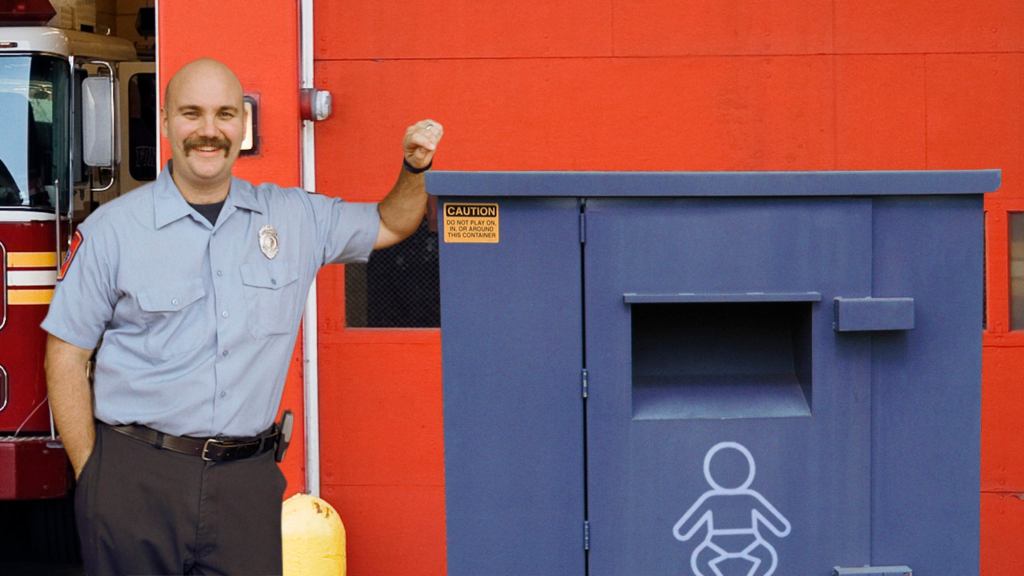 Firefighter Excitedly Checks Drop-Off Bin To See If They Got Any Babies While They Were Out