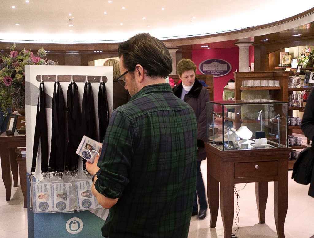 Tourist In White House Gift Shop Browses Rack Of Security Clearances