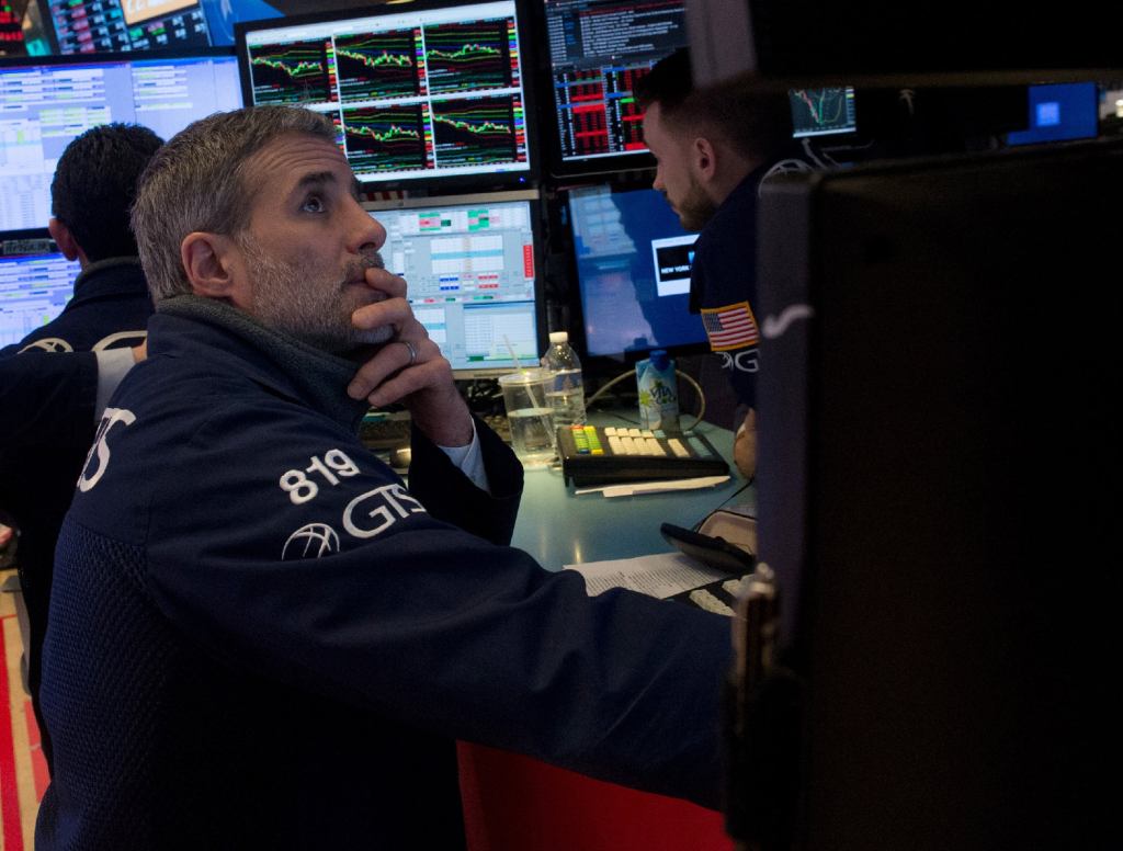 Dow Drops 600 Points Over Picture Of Worried Stock Broker Staring At Computer Screen