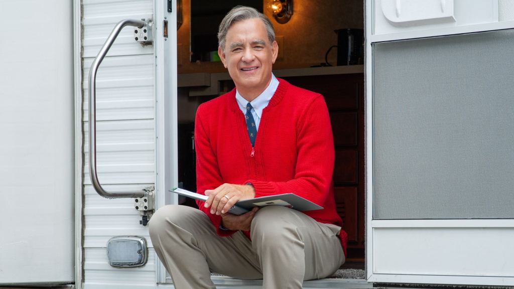 Tom Hanks Recalls Arriving On ‘A Beautiful Day In The Neighborhood’ Set At Dawn For Grueling 6-Hour Cardigan-Application Process