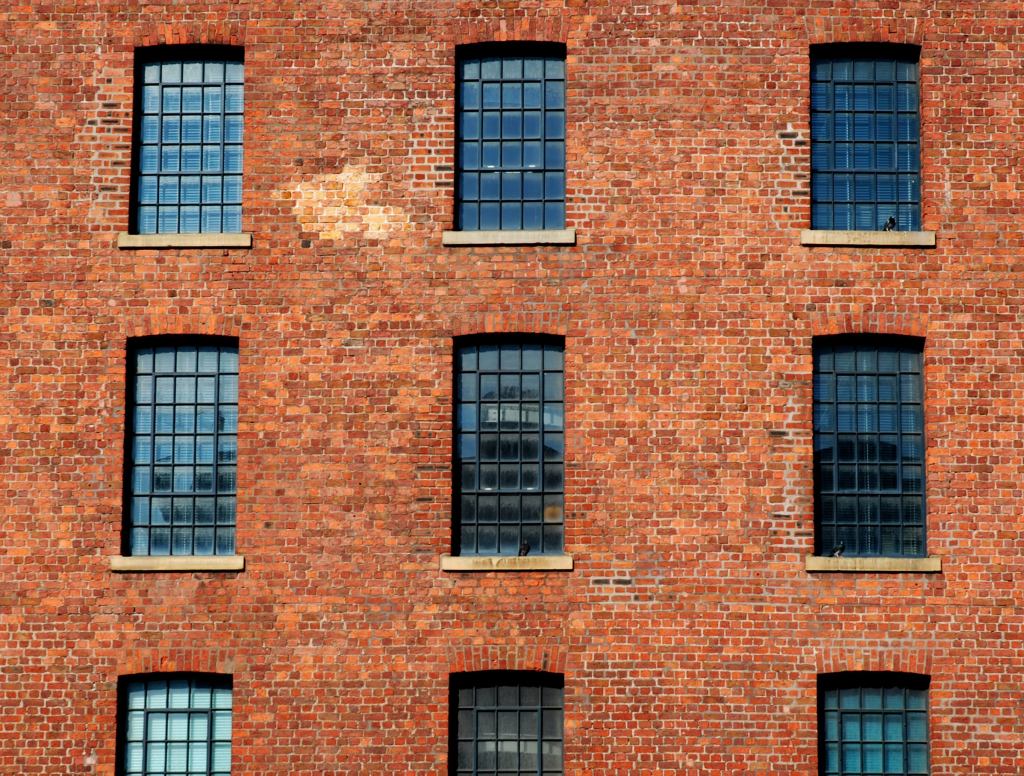 Building Self-Conscious About Patch Of Discolored Bricks