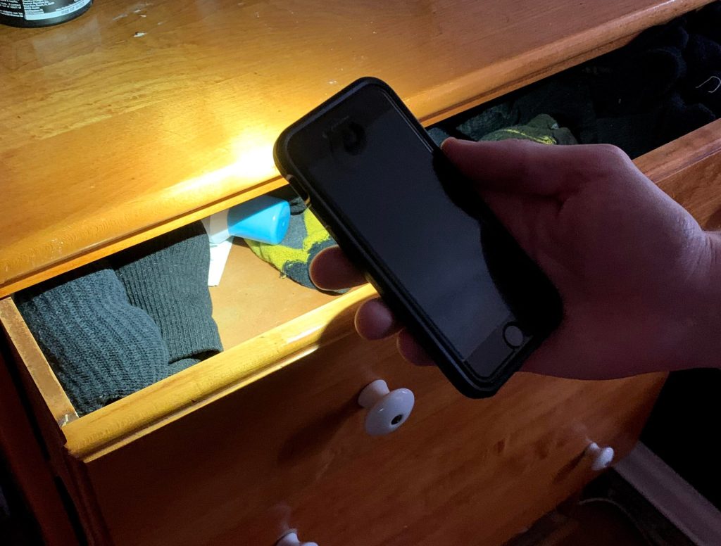 Man Shines Phone Light Over Empty Condom Drawer Like Wily Groundskeeper Hunting For Trespassers