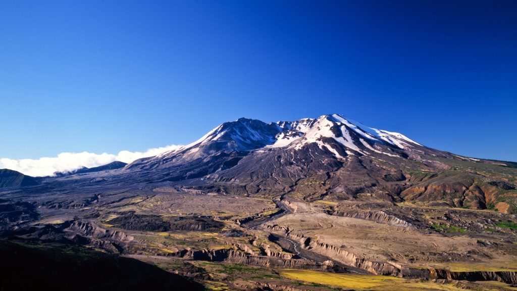 Mount St. Helens’ Anniversary Brings Divided Nation Together To Remember Grisly Scene In ‘Dante’s Peak’ When Dude’s Elbow Pops Out