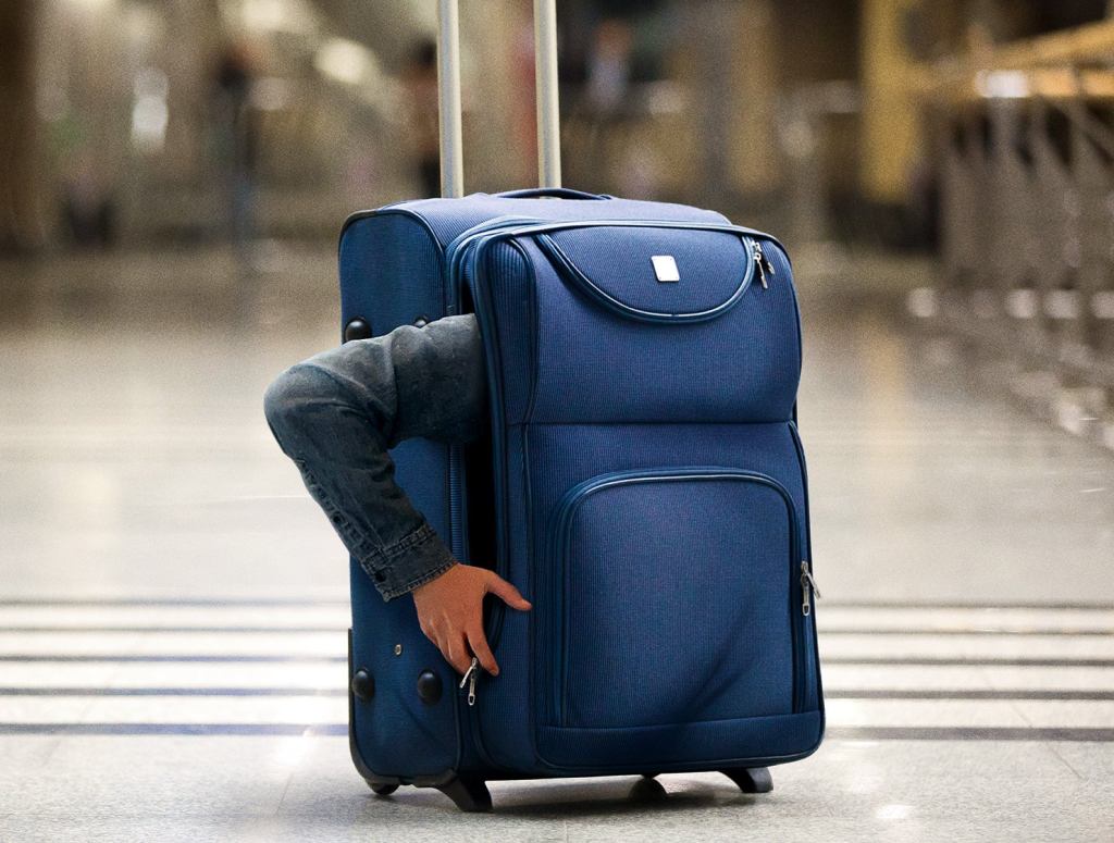 Traveling Contortionist Excited To Get Off The Road And Finally Stop Living Inside Suitcase