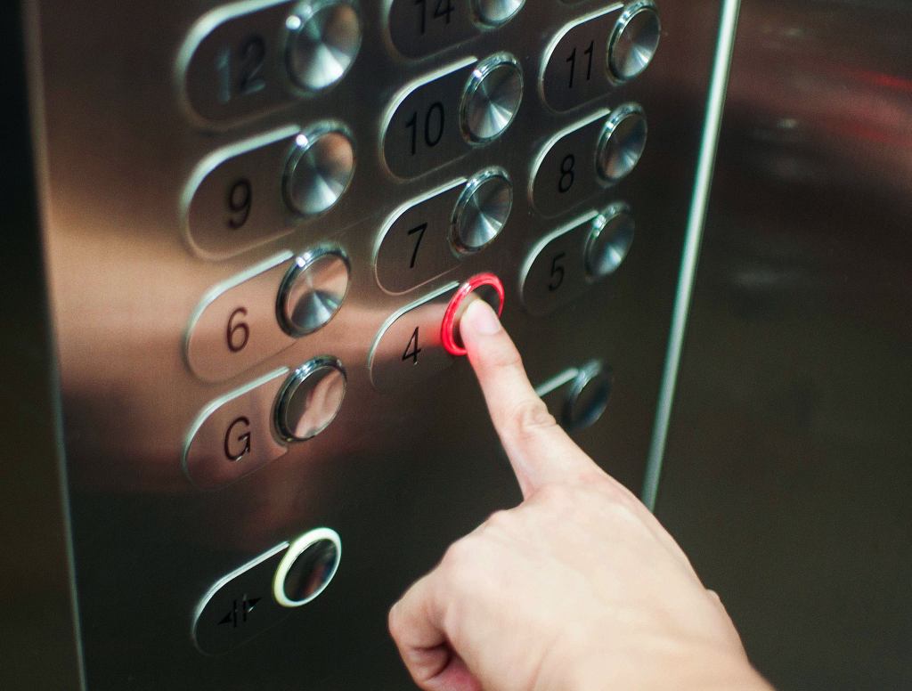 Man Throws Caution To The Wind By Touching Elevator Button With Bare Finger