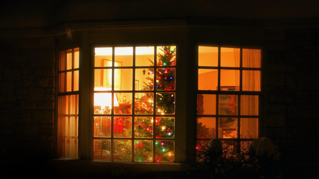 Ungrateful Pricks On Sidewalk Not Even Glancing At Christmas Tree Placed In Window To Bring Them Holiday Cheer