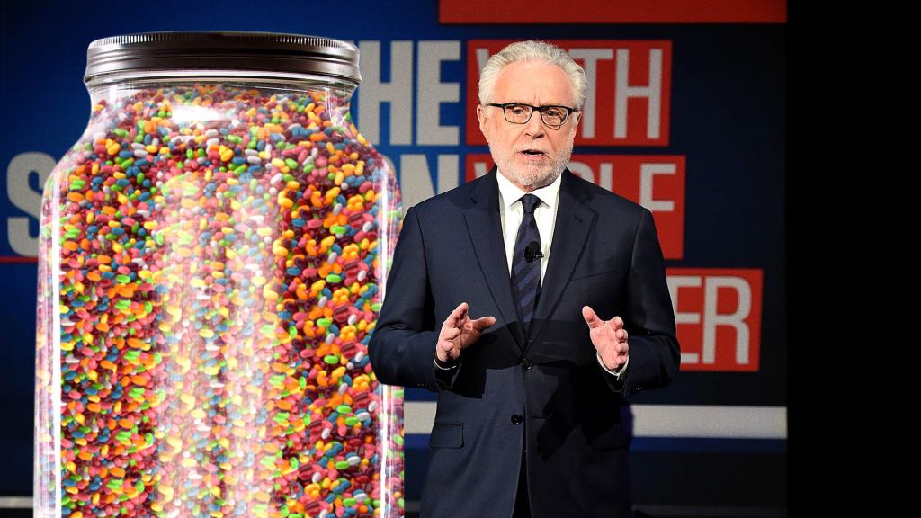 Wolf Blitzer Announces Grim Milestone As Number Of Covid-19 Deaths Surpasses Jelly Beans In Jar