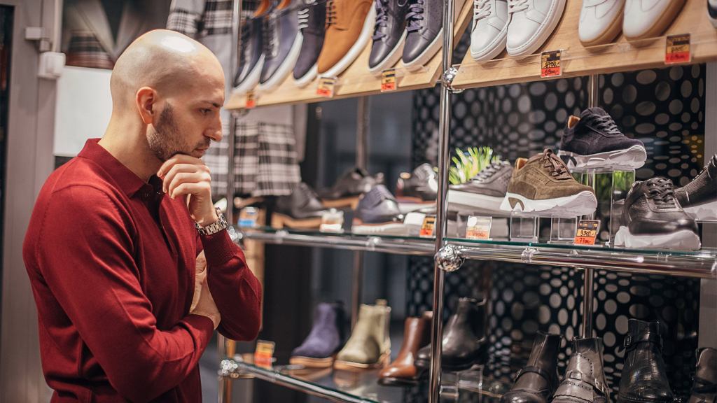 Man Shopping For Bowling Shoe That Can Also Be Worn To Funerals, Weddings