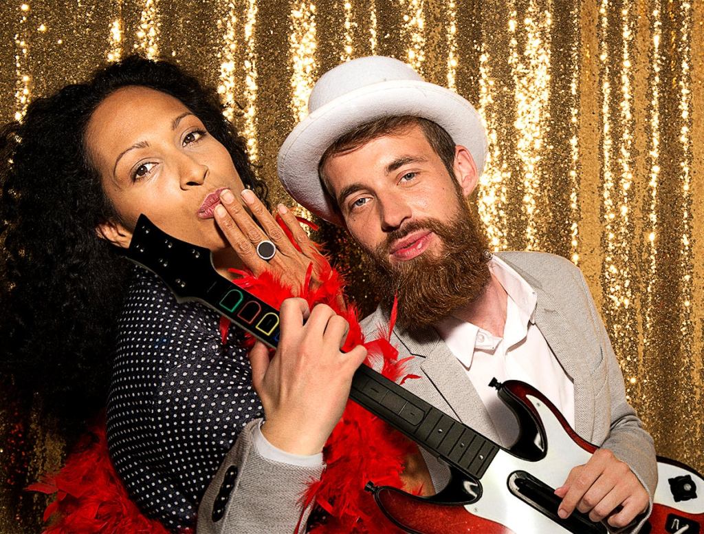 Hardware Hack! This ‘Guitar Hero’ Guitar Is Being Used As A Wedding Photobooth Prop