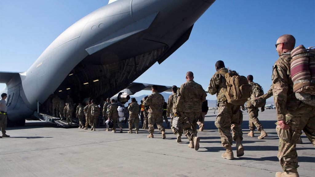 Final U.S. Soldiers In Afghanistan Do Some Last-Second Nation-Building On Way To Plane